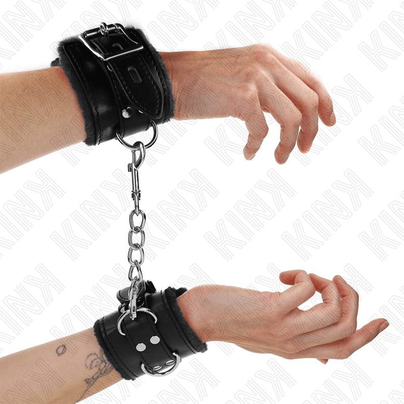 KINK - FUR LINED WRIST RESTRAINTS BLACK WITH BLACK BELT ADJUSTABLE 17 - 29 CM X 6 CM - Kink&Play
