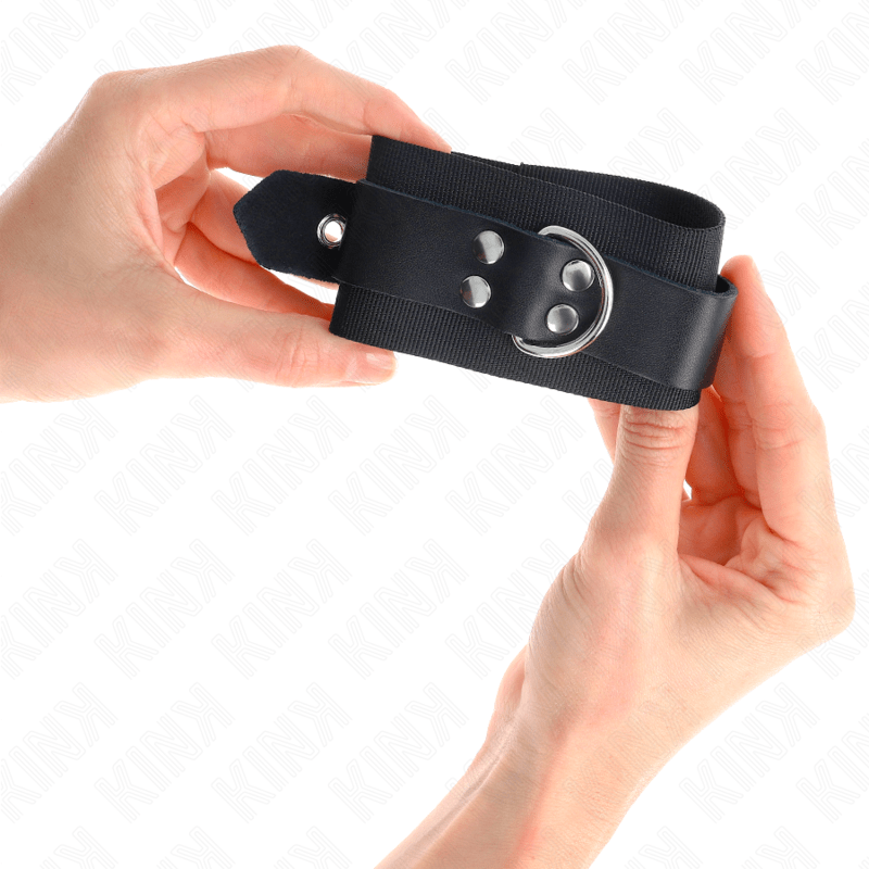 KINK - NYLON WRIST RESTRAINTS BLACK WITH LEATHER BELT BLACK ADJUSTABLE 19 - 29 CM X 5.1 CM - Kink&Play