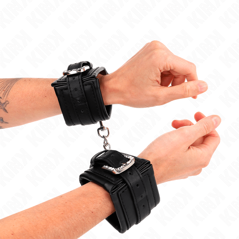 KINK - RHINESTONE BUCKLE WRIST RESTRAINTS BLACK ADJUSTABLE 25 - 32 CM X 5.5 CM - Kink&Play